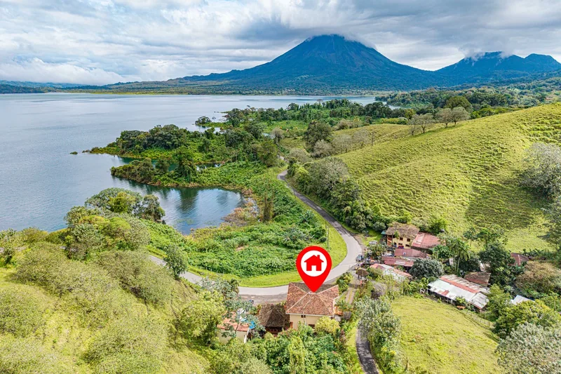 El Castillo sits on the south-west shoulder, facing the cone across the valley.