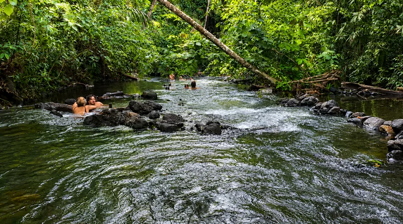 No gate, no ticket office — a river with people in it.