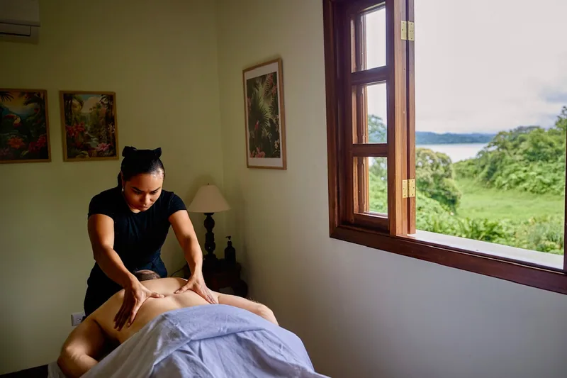 The massage room, with its own half bath, on the third floor.