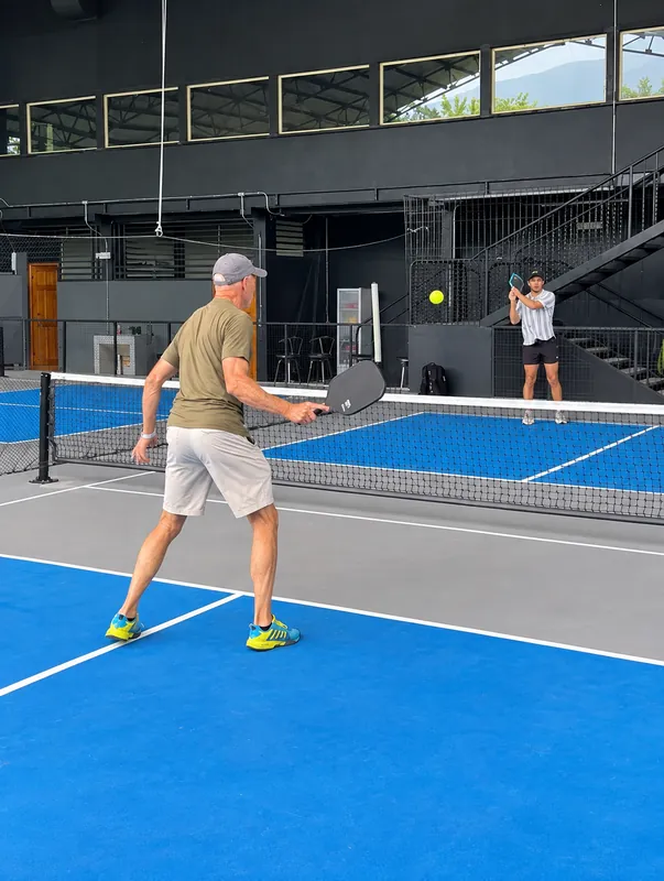 Playing under the roof at Volcan Courts in La Fortuna, Costa Rica